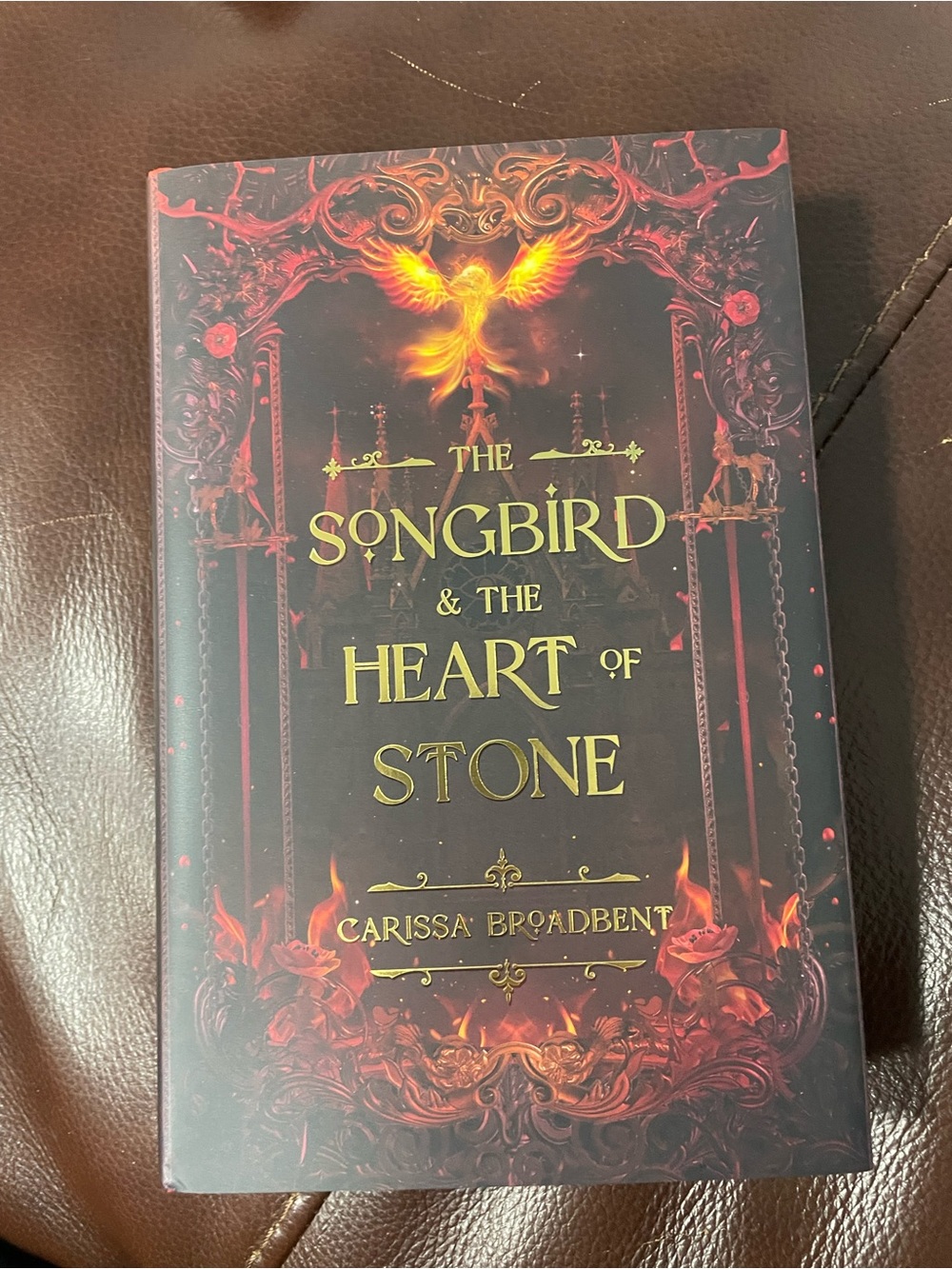 Owlcrate Signed The Songbird & The Heart of Stone Hardback by Carissa Broadbent